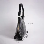 نمای کناری کیف چرمی زنانه مشکی با ابعاد 40x31x12 سانتی‌متر – مدل لونا