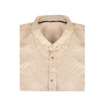 نمای بالا از پیراهن خال خالی کرم رنگ