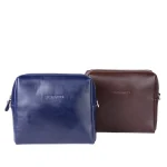 نمای رو به رو کیف چرم ادری زنانه رنگ قهوه‌ای و سورمه‌ای